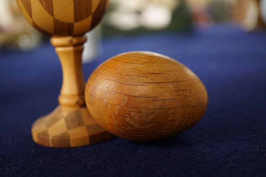 David Linley, a carved oak egg and stickware egg cup